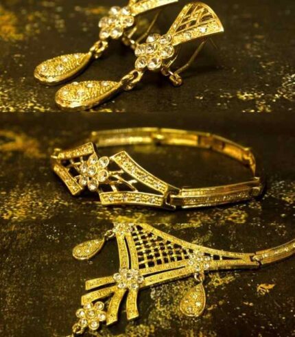 Gold-Plated Floral Set with crystal-tipped floral motifs, including necklace, earrings, and bracelet from L’Africaine Boutique.
