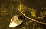 Gold Leaf Jewelry Set Necklace, Earrings, and Bracelet Set with soft curves and crystal accents from L’Africaine Boutique.