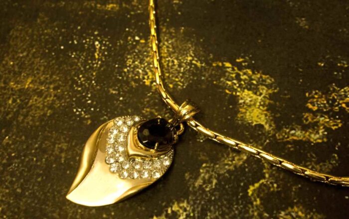 Gold Leaf Jewelry Set Necklace, Earrings, and Bracelet Set with soft curves and crystal accents from L’Africaine Boutique.