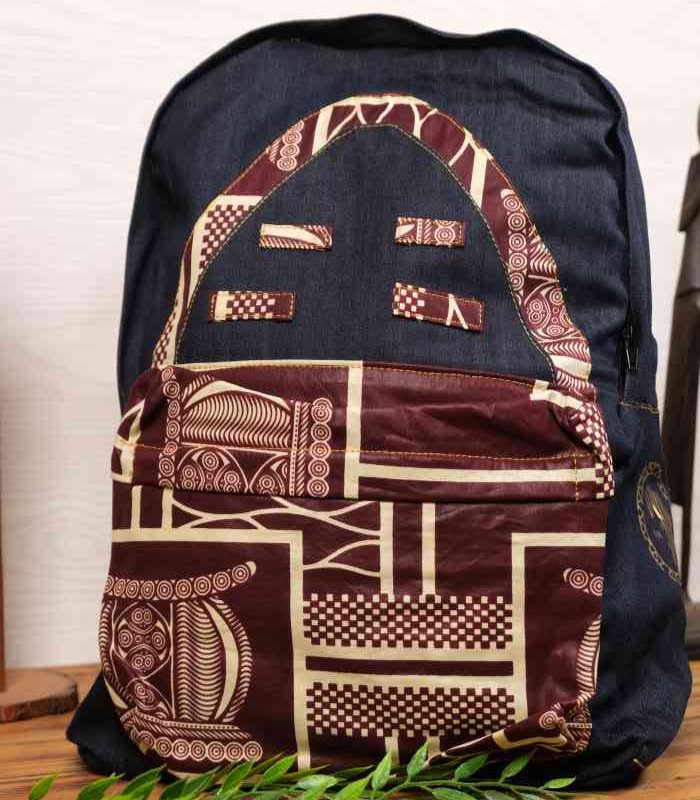 The Maroon Indigo Heritage Backpack by L’Africaine Boutique features bold African prints, indigo fabric, and spacious design—perfect for daily use or travel.