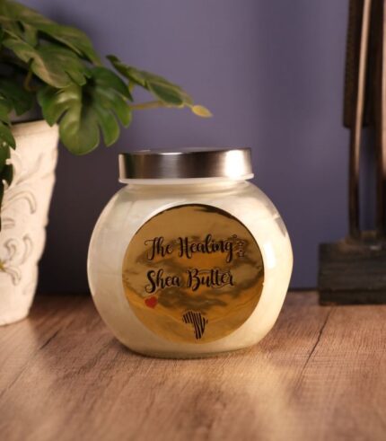 The Healing Shea Butter – organic skincare product in a natural container, rich in vitamins A, E & F, used for moisturizing, healing, and hair growth.