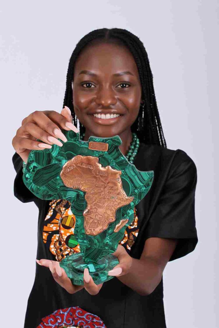 Large Malachite Africa Map shaped like the African continent with copper inlays marking borders and names, symbolizing heritage and strength.