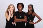 Teardrop-shaped green malachite pendant with natural banding on a black cord, symbolizing healing and emotional release.