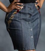 Contrast Denim Skirt in medium-wash denim with yellow-and-blue Ankara inserts and button-down front from L’Africaine Boutique.