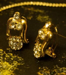 Crystal Drop Earrings with gold-plated frames and cascading round-cut clear crystals from L’Africaine Boutique.