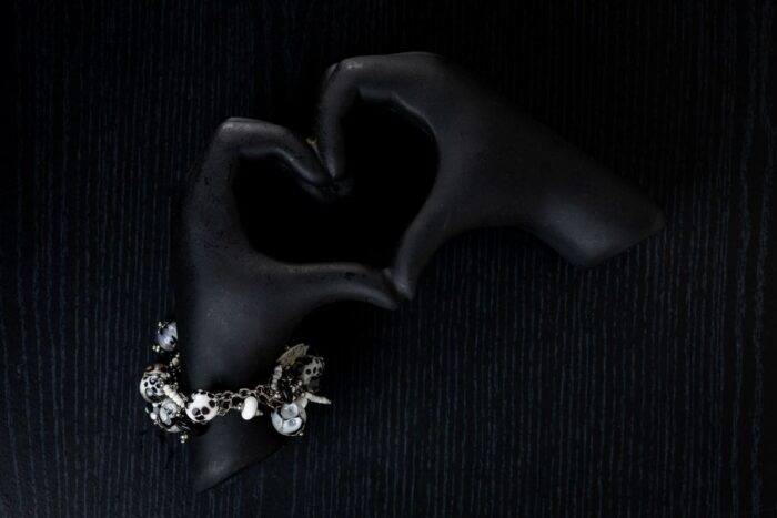 Dalmatians bracelet with black and white glass beads featuring marbled swirls and spotted motifs from L’Africaine Boutique.