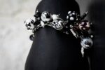 Dalmatians bracelet with black and white glass beads featuring marbled swirls and spotted motifs from L’Africaine Boutique.