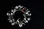 Dalmatians bracelet with black and white glass beads featuring marbled swirls and spotted motifs from L’Africaine Boutique.
