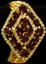 Diamond Crystal Bracelet Trio bracelet with emerald, teal-blue, and ruby-red crystals bordered by clear stones from L’Africaine Boutique.