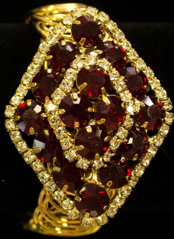 Diamond Crystal Bracelet Trio bracelet with emerald, teal-blue, and ruby-red crystals bordered by clear stones from L’Africaine Boutique.