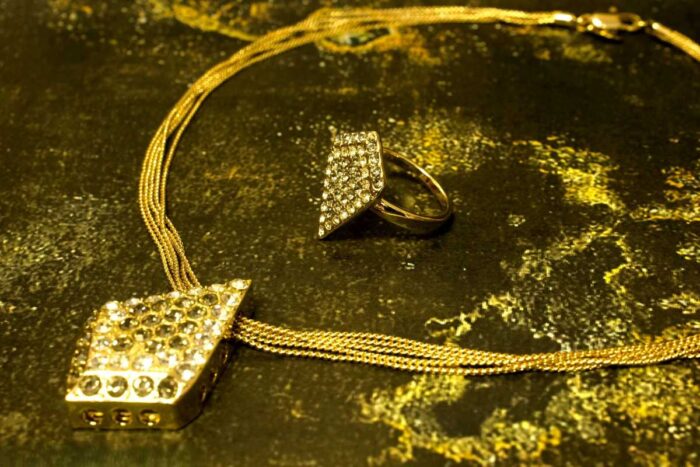 Diamond Pave Necklace and Ring Set with gold-plated geometric shapes and shimmering pave stones from L’Africaine Boutique.