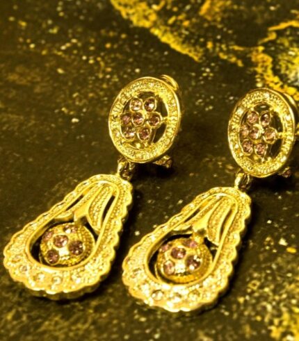 Elegant Teardrop Necklace and Earrings Set with gold-plated engravings and red gem accents from L’Africaine Boutique.
