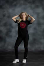 Floral Medallion Tee with layered red and navy floral print, rhinestones, and gold accents on black cotton from L’Africaine Boutique.