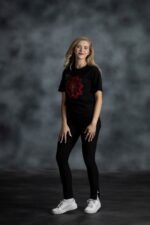 Floral Medallion Tee with layered red and navy floral print, rhinestones, and gold accents on black cotton from L’Africaine Boutique.