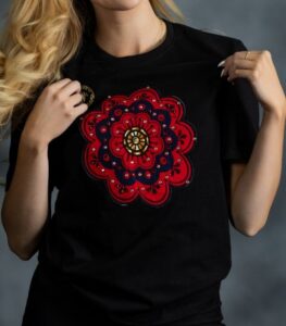 Floral Medallion Tee with layered red and navy floral print, rhinestones, and gold accents on black cotton from L’Africaine Boutique.