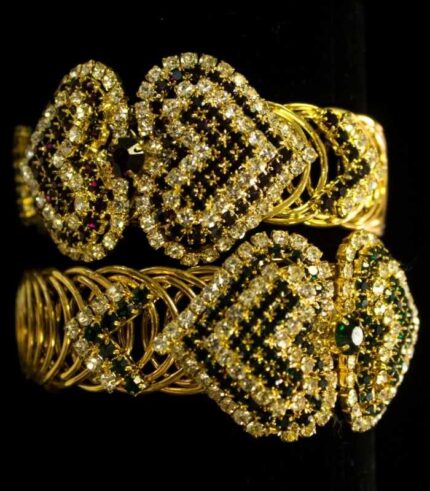 Gold-Plated Heart Bangles with woven heart-shaped patterns and rows of sparkling stones from L’Africaine Boutique.