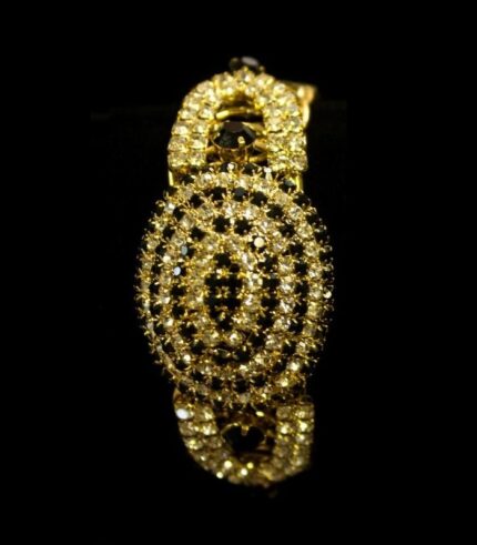 Gold-Plated Oval Bangles with concentric crystal patterns in black, aqua, and ruby tones from L’Africaine Boutique.
