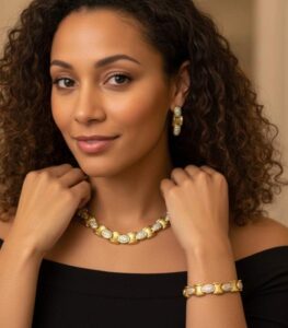 Golden Oval Link Bracelet and Earrings Set with polished gold-plated links and clear crystal inlays from L’Africaine Boutique.