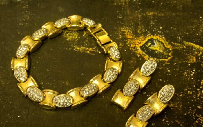 Golden Oval Link Bracelet and Earrings Set with polished gold-plated links and clear crystal inlays from L’Africaine Boutique.