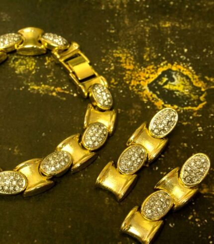 Golden Oval Link Bracelet and Earrings Set with polished gold-plated links and clear crystal inlays from L’Africaine Boutique.