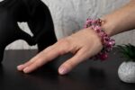Rose Syrup bracelet with blush, fuchsia, and deep rose glass beads featuring floral-like swirls from L’Africaine Boutique.