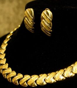 Leaf Link Necklace and Earrings Set with gold-plated leaf-inspired links and textured detailing from L’Africaine Boutique.
