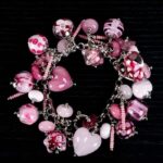 Milkshake Candy bracelet with pink glass beads, candy-striped accents, and marbled gradients from L’Africaine Boutique.