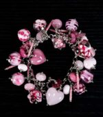 Milkshake Candy bracelet with pink glass beads, candy-striped accents, and marbled gradients from L’Africaine Boutique.