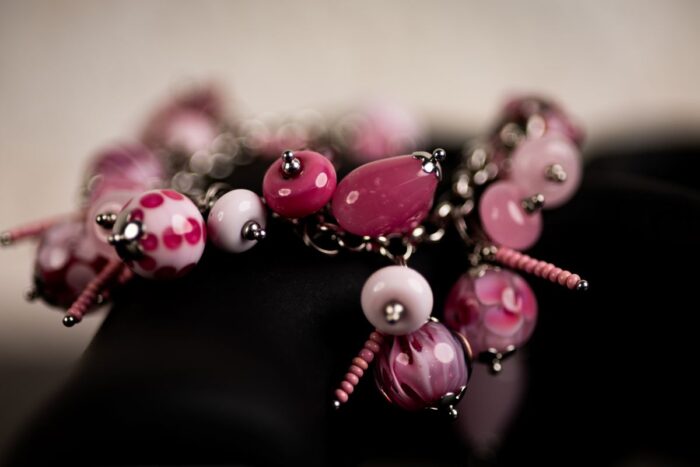 Milkshake Candy bracelet with pink glass beads, candy-striped accents, and marbled gradients from L’Africaine Boutique.