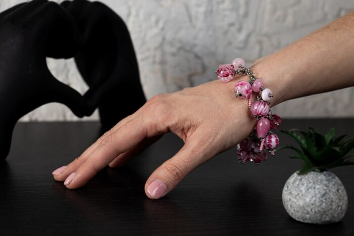 Milkshake Candy bracelet with pink glass beads, candy-striped accents, and marbled gradients from L’Africaine Boutique.