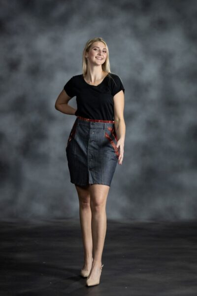 Red Accent Skirt in medium-wash denim with burgundy Ankara waistband and side inserts from L’Africaine Boutique.