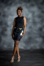 Pop Zipper Skirt by L’Africaine Boutique features full-length zip, frayed hem, and Ankara accents—crafted for bold style and modern edge.