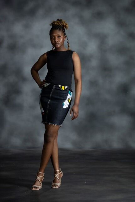Pop Zipper Skirt by L’Africaine Boutique features full-length zip, frayed hem, and Ankara accents—crafted for bold style and modern edge.