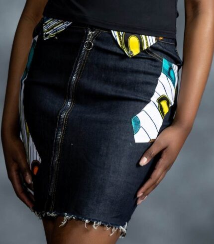 Pop Zipper Skirt by L’Africaine Boutique features full-length zip, frayed hem, and Ankara accents—crafted for bold style and modern edge.