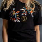 Twin Flower Tee with two African floral prints, rhinestone centers, and gold logo on black cotton from L’Africaine Boutique.