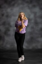 You Are Loved Lilac Tee with yellow African print heart, scattered stars, and red lips from L’Africaine Boutique.