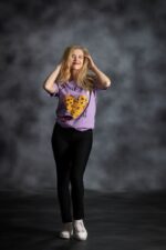 You Are Loved Lilac Tee with yellow African print heart, scattered stars, and red lips from L’Africaine Boutique.