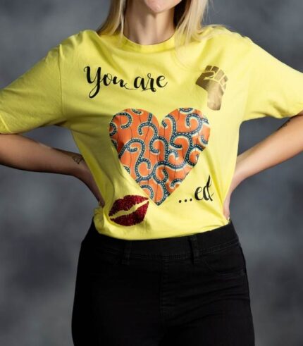 You Are Loved Tee with African print heart, raised fist, and glitter lips from L’Africaine Boutique.