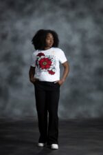 Floral Garden Tee with red blossoms, golden rhinestones, and black-outlined white petals from L’Africaine Boutique.