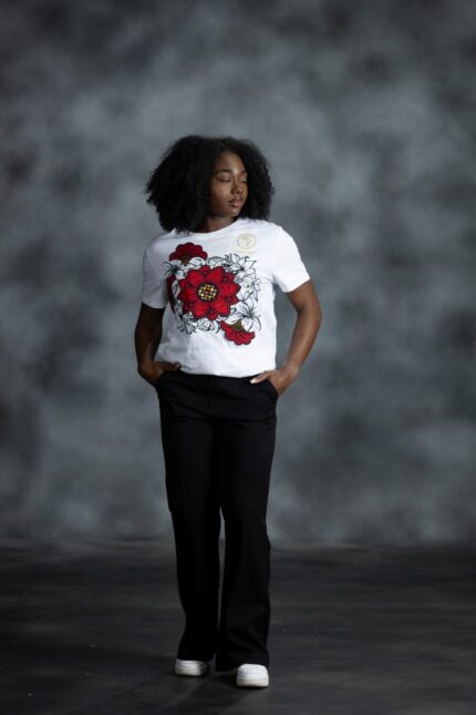 Floral Garden Tee with red blossoms, golden rhinestones, and black-outlined white petals from L’Africaine Boutique.