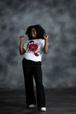 Floral Garden Tee with red blossoms, golden rhinestones, and black-outlined white petals from L’Africaine Boutique.