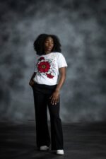 Floral Garden Tee with red blossoms, golden rhinestones, and black-outlined white petals from L’Africaine Boutique.